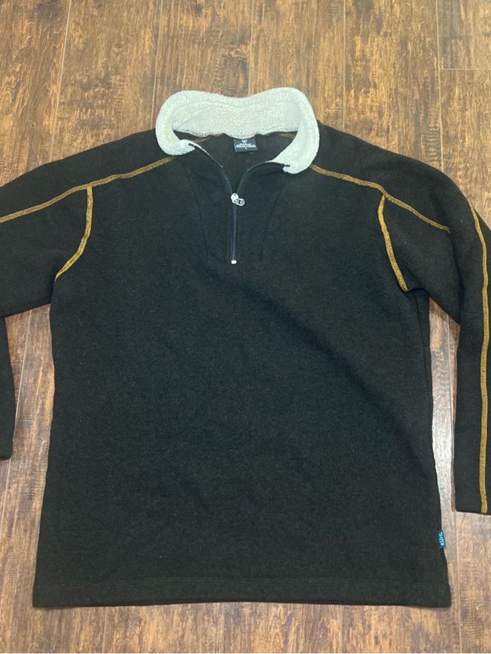 Kuhl Black Quarter-Zip Pullover with Cream Sherpa Collar and Tan Stitching